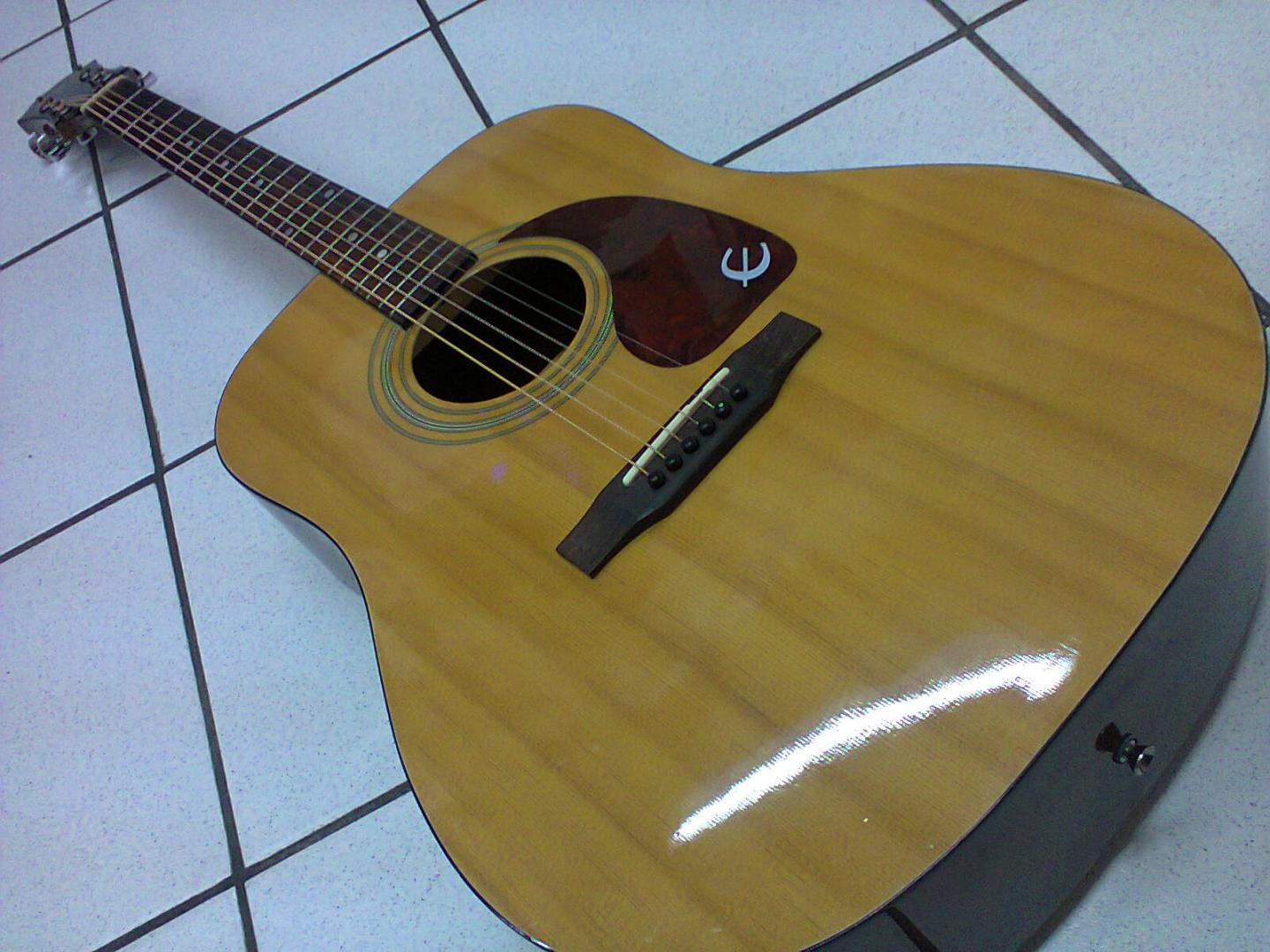 EPIPHONE PR150 NA EPIPHONE PR150 NA **OCCASION** GUITARE ACOUSTIQUE NATURELLE VERNIE. TABLE EPICEA. DOS ECLISSES ACAJOU. MANCHE OKOUME. TOUCHE CHEVALET PALISSANDRE.
