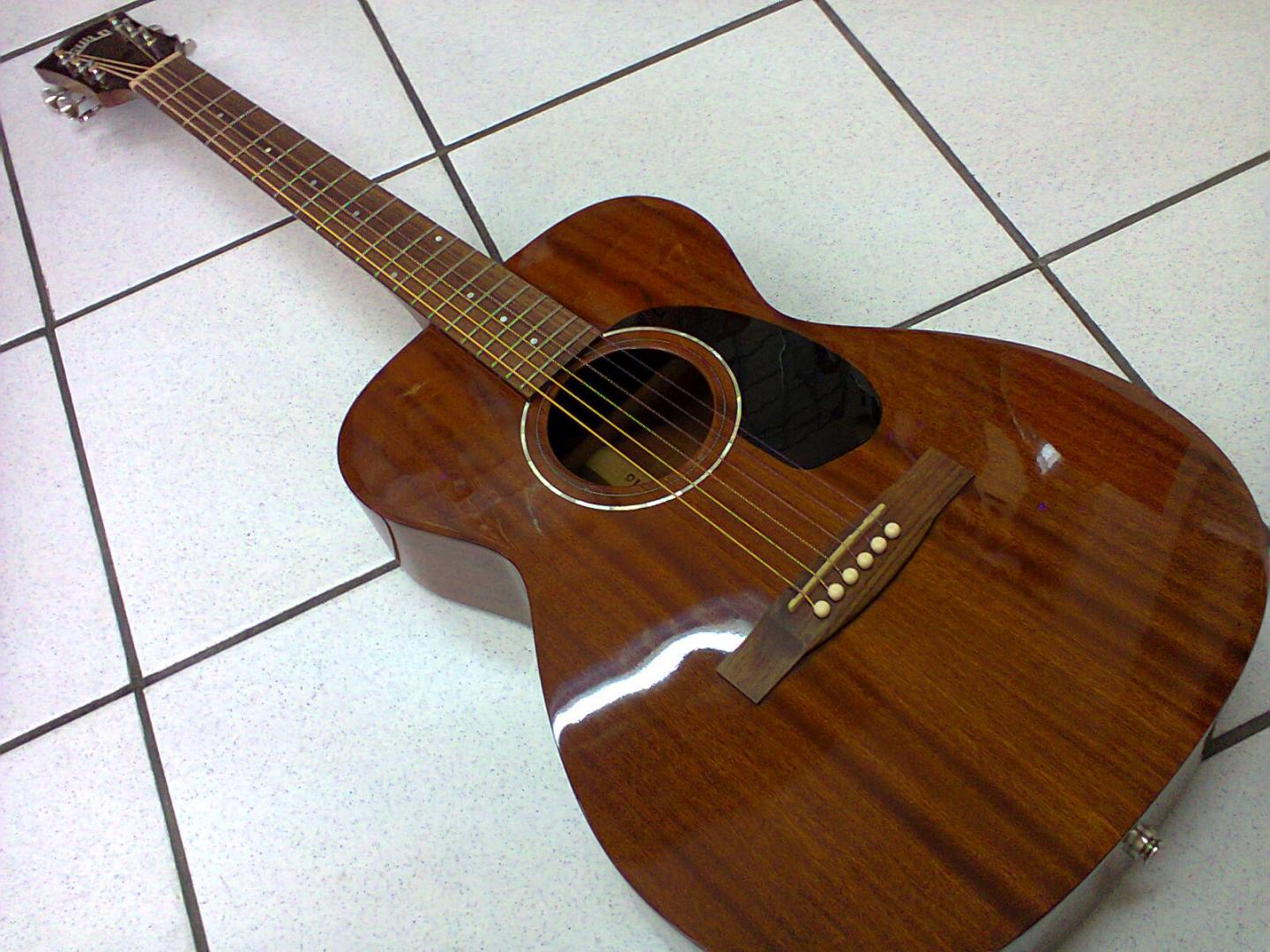 Guild M-120E Nat Westerly Guild M-120E Nat Westerly GUITARE ELECTRO ACOUSTIQUE NATURELLE VERNIE. CORPS ET MANCHE ACAJOU MASSIF. TOUCHE ET CHEVALET PALISSANDRE. PREAMPLI FISHMAN. MECANIQUE VINTAGE.